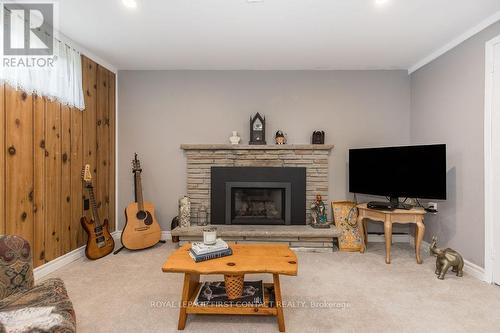 33 Roslyn Road, Barrie (Wellington), ON - Indoor Photo Showing Living Room With Fireplace