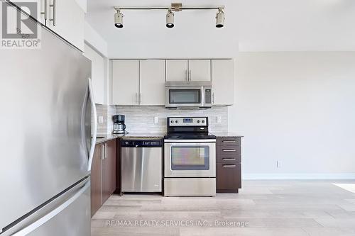 415 - 80 Esther Lorrie Drive, Toronto (West Humber-Clairville), ON - Indoor Photo Showing Kitchen With Stainless Steel Kitchen