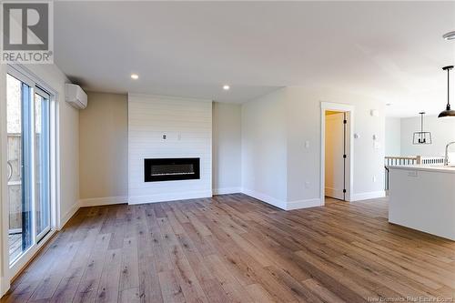 126 Elsliger Street, Dieppe, NB - Indoor Photo Showing Living Room With Fireplace