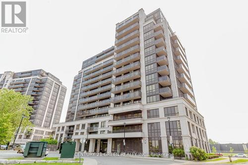 217 - 55 De Boers Drive, Toronto, ON - Outdoor With Balcony With Facade