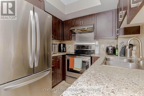 217 - 55 De Boers Drive, Toronto (York University Heights), ON - Indoor Photo Showing Kitchen With Double Sink