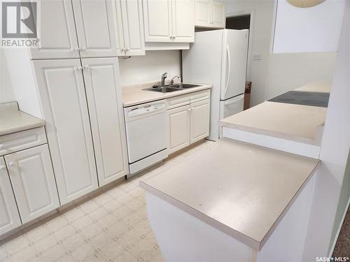 207 211 Crawford Avenue W, Melfort, SK - Indoor Photo Showing Kitchen With Double Sink