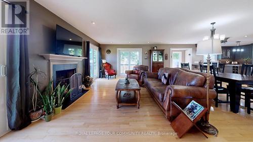 88 Highland Road, Alnwick/Haldimand, ON - Indoor Photo Showing Living Room With Fireplace