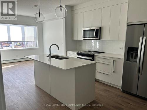 2318 - 395 Skyview Parkway Ne, Calgary, ON - Indoor Photo Showing Kitchen With Stainless Steel Kitchen With Double Sink With Upgraded Kitchen