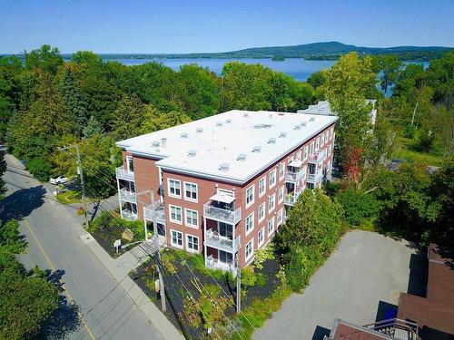 ExtÃ©rieur - 303-542 Rue Main, Hudson, QC - Outdoor With Body Of Water With View