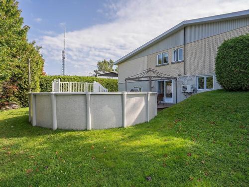 Back facade - 84 Rue Principale, Lambton, QC - Outdoor With Above Ground Pool