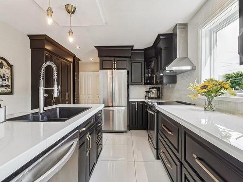 Kitchen - 589 Rue Des Chrysanthèmes, Saint-Eustache, QC - Indoor Photo Showing Kitchen With Double Sink With Upgraded Kitchen