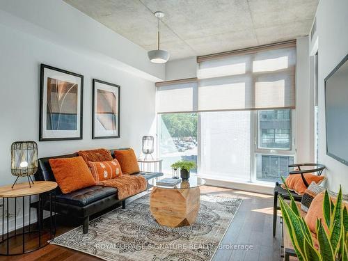 208`-1190 Dundas St E, Toronto, ON - Indoor Photo Showing Living Room