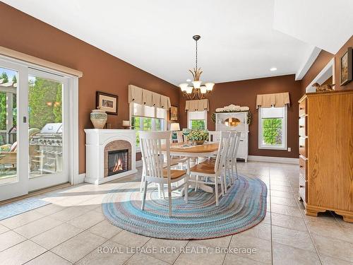 65 Madill Dr, Mono, ON - Indoor Photo Showing Dining Room With Fireplace