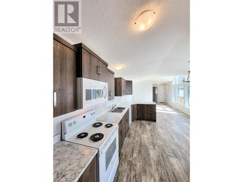 80 684 North Fraser Road, Quesnel, BC - Indoor Photo Showing Kitchen With Double Sink