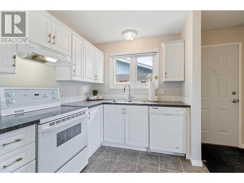 767 Jones Street, Kelowna, BC - Indoor Photo Showing Kitchen With Double Sink