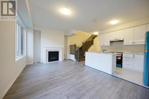 24 Durham Avenue, Barrie (Innis-Shore), ON - Indoor With Fireplace