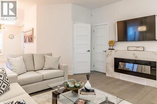 97 Laclie Street, Orillia, ON - Indoor Photo Showing Living Room With Fireplace