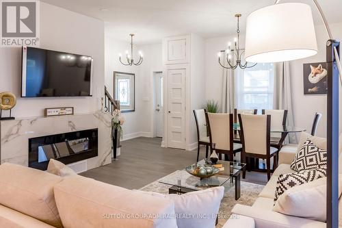 97 Laclie Street, Orillia, ON - Indoor Photo Showing Living Room With Fireplace