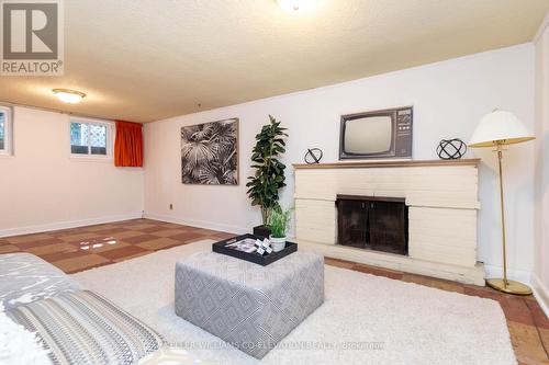 55 Kirk Bradden Road E, Toronto (Stonegate-Queensway), ON - Indoor Photo Showing Living Room With Fireplace