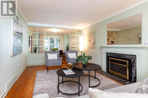 55 Kirk Bradden Road E, Toronto (Stonegate-Queensway), ON - Indoor Photo Showing Living Room With Fireplace