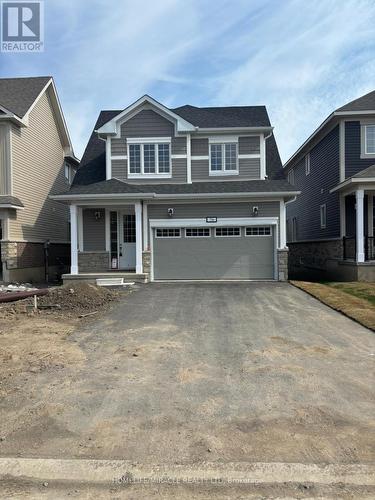 76 Oakmont Drive, Loyalist, ON - Outdoor With Facade