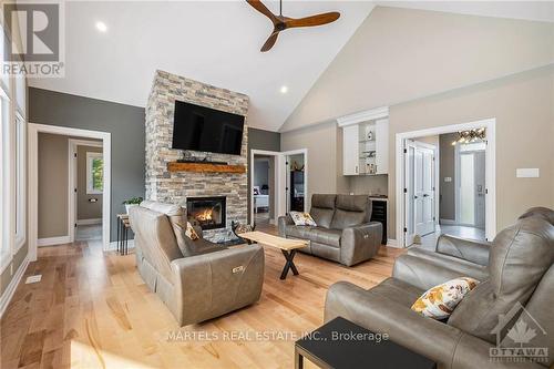 449 Lecours Street, Champlain, ON - Indoor Photo Showing Living Room With Fireplace