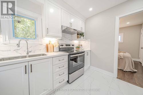 250 Mcnaughton Avenue, Oshawa (Central), ON - Indoor Photo Showing Kitchen With Double Sink With Upgraded Kitchen