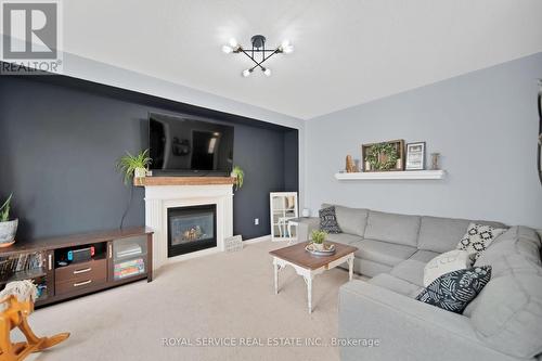 22 Thomas Woodlock Street, Clarington (Newcastle), ON - Indoor Photo Showing Living Room With Fireplace