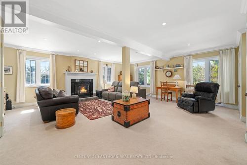 2009 County Rd 13 Road, Prince Edward County (South Marysburgh), ON - Indoor Photo Showing Living Room With Fireplace