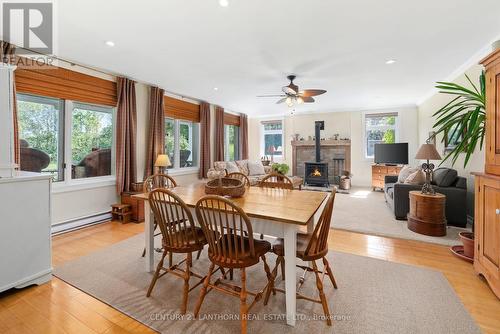 2009 County Rd 13 Road, Prince Edward County (South Marysburgh), ON - Indoor Photo Showing Dining Room With Fireplace