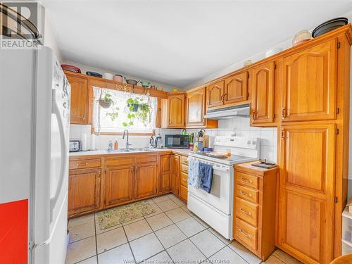 2972 Meadowbrook Lane Unit# 1, Windsor, ON - Indoor Photo Showing Kitchen With Double Sink