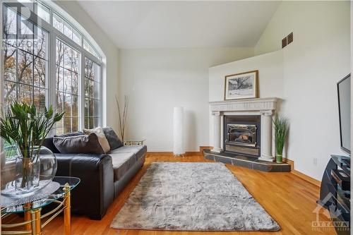 461 John Aselford Drive, Ottawa, ON - Indoor Photo Showing Living Room With Fireplace