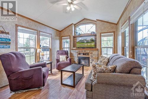 276 White Cedars Road, Eganville, ON - Indoor Photo Showing Living Room With Fireplace