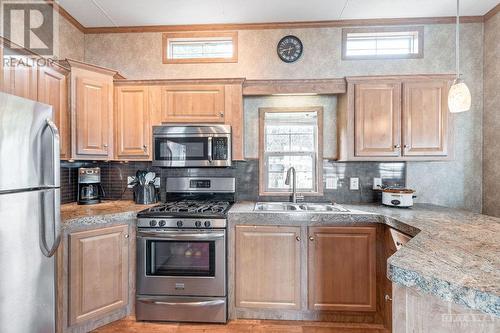 276 White Cedars Road, Eganville, ON - Indoor Photo Showing Kitchen With Double Sink