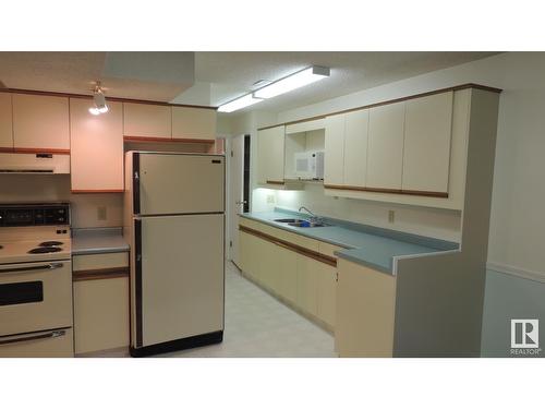 11839 54 St Nw, Edmonton, AB - Indoor Photo Showing Kitchen With Double Sink