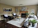 3730 12 St Nw, Edmonton, AB  - Indoor Photo Showing Living Room With Fireplace 