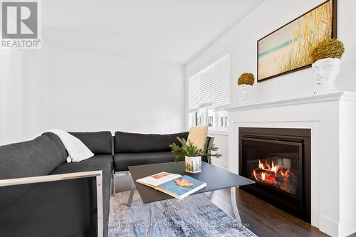 22 Autumn Drive, Wasaga Beach, ON - Indoor Photo Showing Living Room With Fireplace