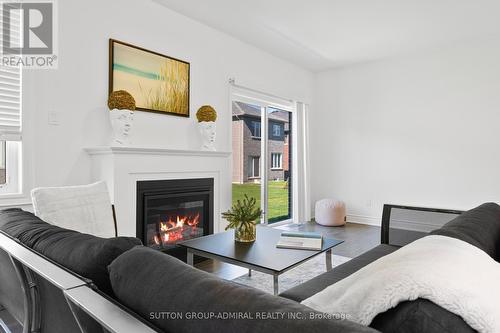 22 Autumn Drive, Wasaga Beach, ON - Indoor Photo Showing Living Room With Fireplace