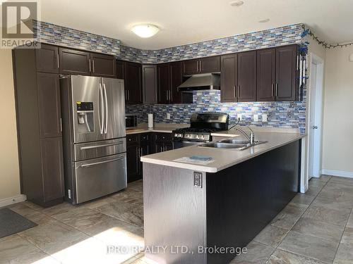 79 Oakes Crescent, Guelph, ON - Indoor Photo Showing Kitchen With Stainless Steel Kitchen With Double Sink