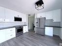 99 Wahstao Cr Nw, Edmonton, AB  - Indoor Photo Showing Kitchen With Upgraded Kitchen 