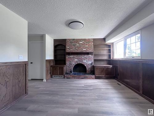 99 Wahstao Cr Nw, Edmonton, AB - Indoor With Fireplace