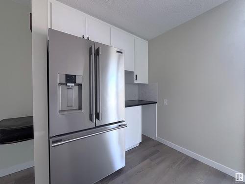 99 Wahstao Cr Nw, Edmonton, AB - Indoor Photo Showing Kitchen With Stainless Steel Kitchen