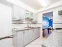 305-10 Tobermory Dr, Toronto, ON  - Indoor Photo Showing Kitchen With Double Sink 