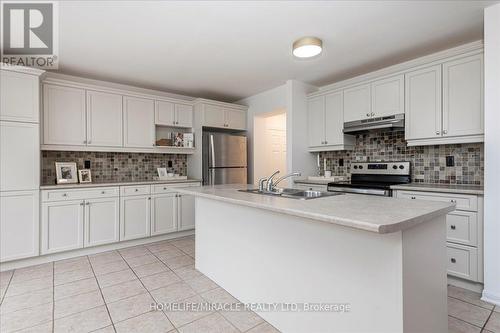 70 Steele Street, New Tecumseth, ON - Indoor Photo Showing Kitchen With Double Sink