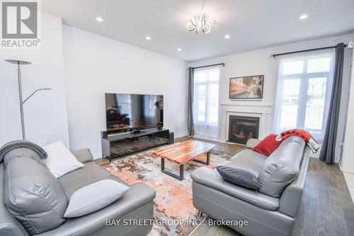 9 Copperhill Heights, Barrie, ON - Indoor Photo Showing Living Room With Fireplace