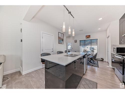 3248 Kulay Wy Sw, Edmonton, AB - Indoor Photo Showing Kitchen With Double Sink