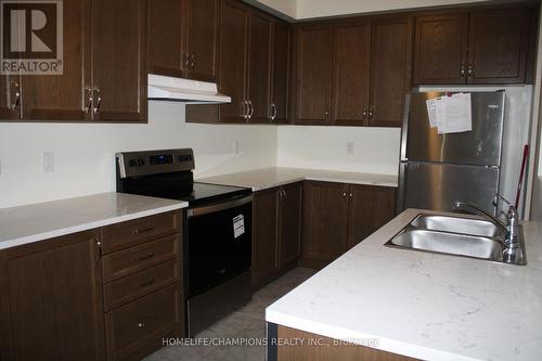 1183 Kettering Drive W, Oshawa, ON - Indoor Photo Showing Kitchen With Double Sink