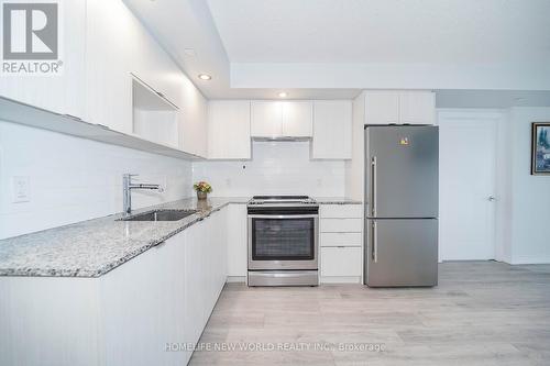 1306 - 225 Village Green Square, Toronto, ON - Indoor Photo Showing Kitchen With Stainless Steel Kitchen With Upgraded Kitchen