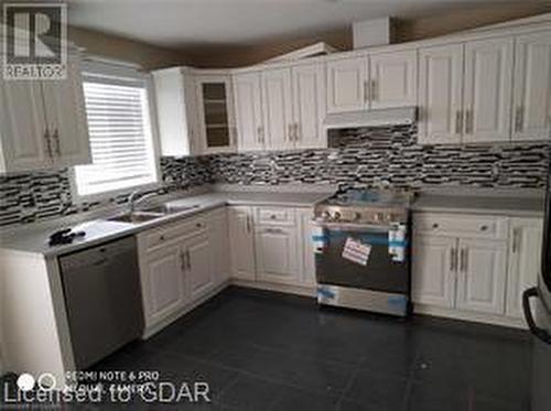 4 Ambrous Crescent, Guelph, ON - Indoor Photo Showing Kitchen With Double Sink With Upgraded Kitchen