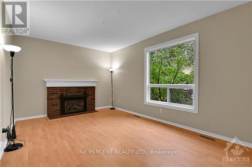 28 Phylis Street, Ottawa, ON - Indoor Photo Showing Other Room With Fireplace