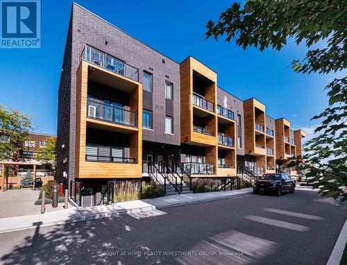 228 - 1145 Journeyman Lane, Mississauga, ON - Outdoor With Balcony With Facade