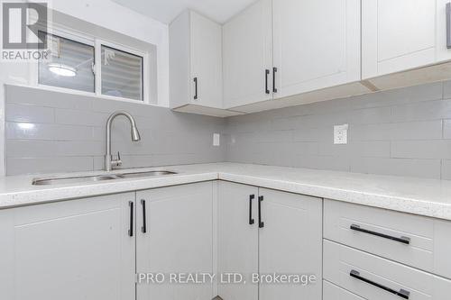 7094 Darcel Avenue, Mississauga, ON - Indoor Photo Showing Kitchen With Double Sink