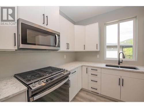 2508 Shuswap Avenue Unit# 9, Lumby, BC - Indoor Photo Showing Kitchen With Double Sink