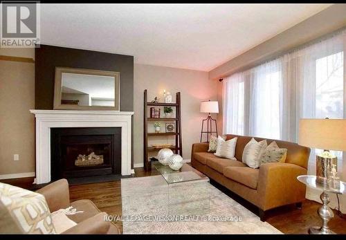 1838 Woodgate Court, Oshawa, ON - Indoor Photo Showing Living Room With Fireplace